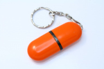 La memoria USB de Plástico en una cápsula el color Naranja