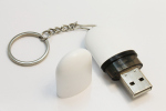La memoria USB de plástica en una cápsula blanca